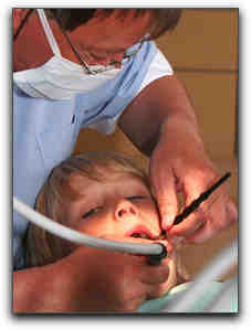 At what age should a child begin seeing a pediatric dentist?