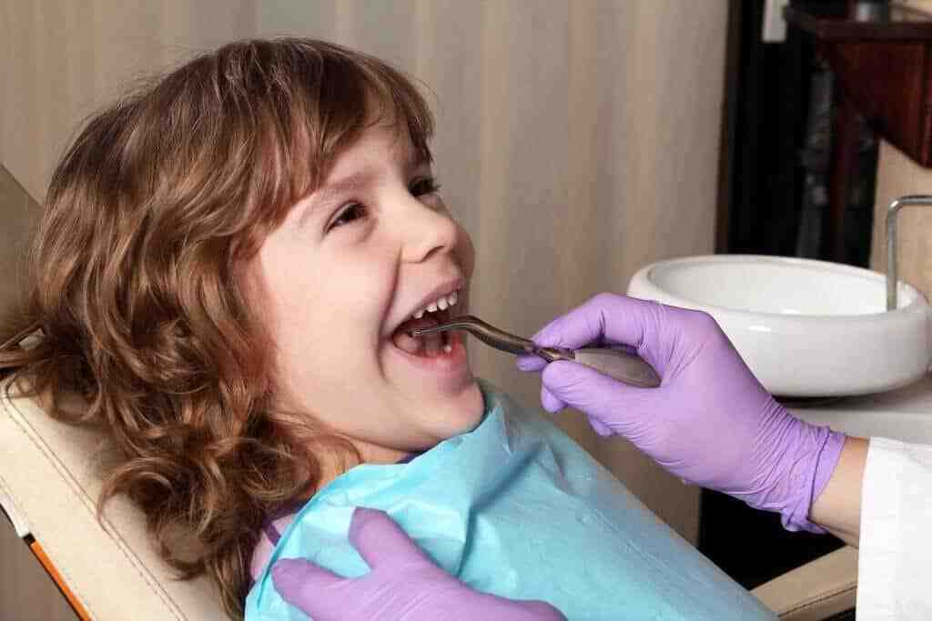 How often should a 7 year old go to the dentist?