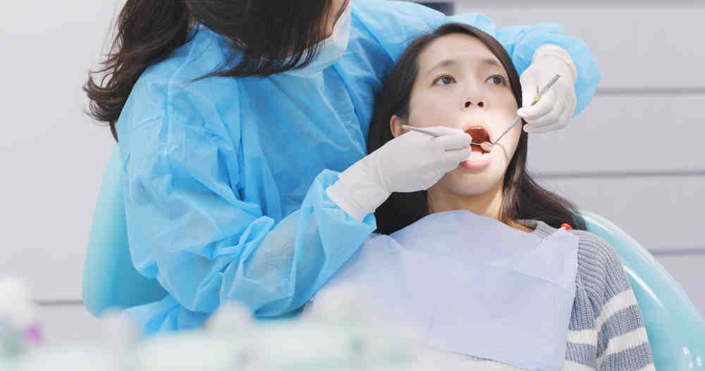 What dental services does Medi-cal cover for adults?
