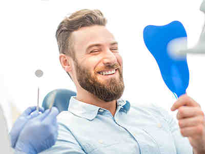What is the difference between a dentist and a cosmetic dentist?