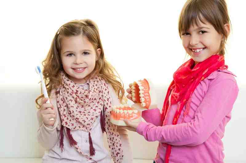 At what age should a child begin seeing a pediatric dentist?