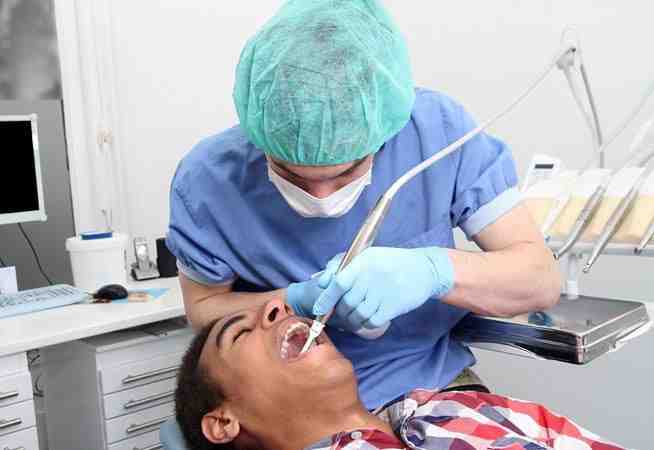 Does dental insurance cover oral surgeons?