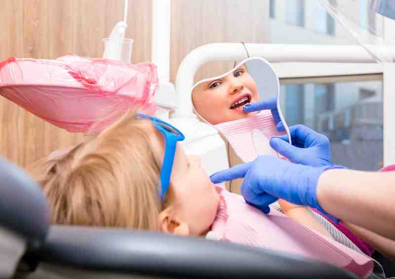 What ages do pediatric dentists treat?