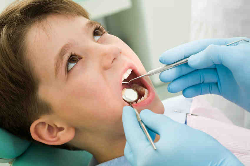 What age do you stop seeing a pediatric dentist?
